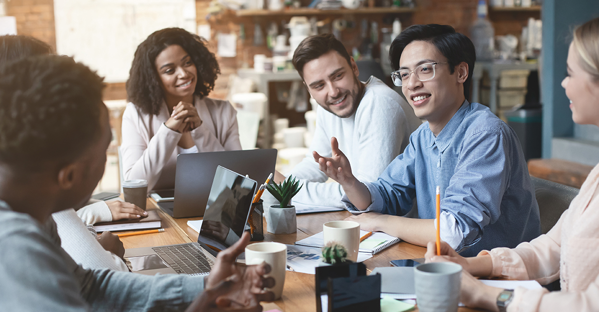 Young professionals in a collaborative business meeting environment